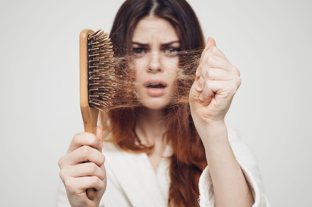 Сильне випадіння волосся: як знайти причину та допомогти собі-Фото 1
